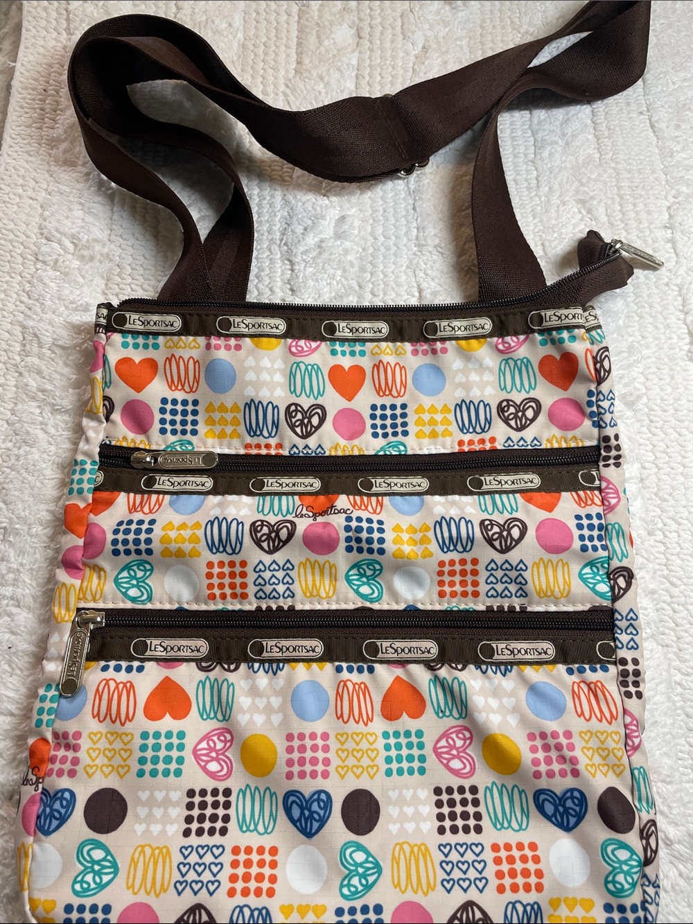 Lesportsac Multi-Color Heart & Dot Print Crossbody Bag with Brown Strap